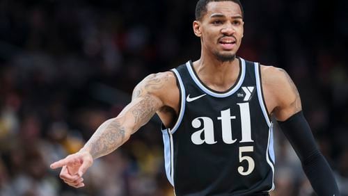 Hawks guard Dejounte Murray (5) argues a call with an official during the Hawks win at State Farm Arena, Tuesday, January 30, 2024, in Atlanta. The Hawks won 138-122. (Jason Getz / jason.getz@ajc.com)