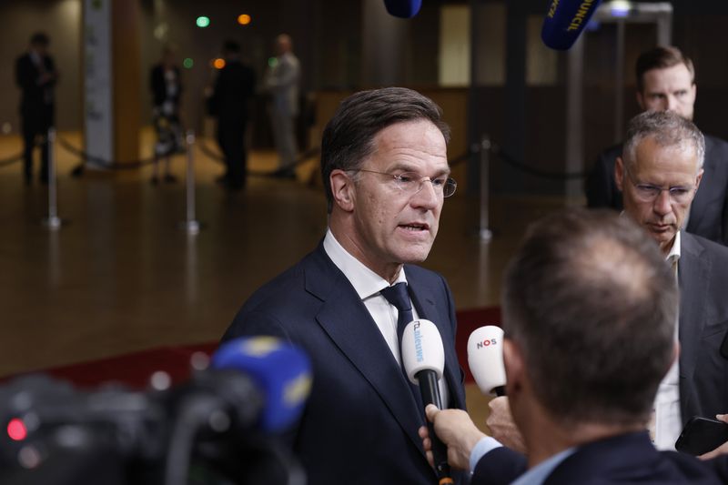 Netherland's Prime Minister Mark Rutte addresses the media at the end of an EU summit in Brussels, early Tuesday, June 18, 2024. Leaders of European Union countries on Monday reached no final agreement on candidates for the bloc's top jobs, but several praised the record of European Commission President Ursula von der Leyen, and she appeared on track to secure their endorsement later this month for a second term in office. (AP Photo/Omar Havana)