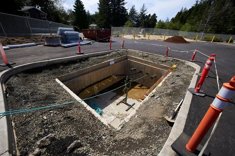 Concrete vaults under the parking lot at Driftwood State Beach where subsea cables connected to the wave energy test site arrive on land and connect to land cables in Newport, Ore., Friday, Aug. 23, 2024. (AP Photo/Craig Mitchelldyer)