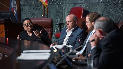 Chair woman Leah Ward Sears (left) confers with other task force members during the first meeting of a task force established to review the inspector general's authority at Atlanta City Hall, Tuesday, September 24, 2024, in Atlanta. The task force established to review the procedures of the Office of the Inspector General and Ethics Office met for the first time Tuesday. (Hyosub Shin / AJC)