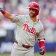 Philadelphia Phillies' Whit Merrifield celebrates after hitting a 3-run home run against the New York Mets during the fourth inning of a London Series baseball game in London, Saturday, June 8, 2024. (AP Photo/Kirsty Wigglesworth)