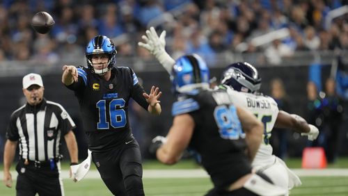 Detroit Lions quarterback Jared Goff (16) passes during the first half of an NFL football game against the Seattle Seahawks, Monday, Sept. 30, 2024, in Detroit. (AP Photo/Paul Sancya)