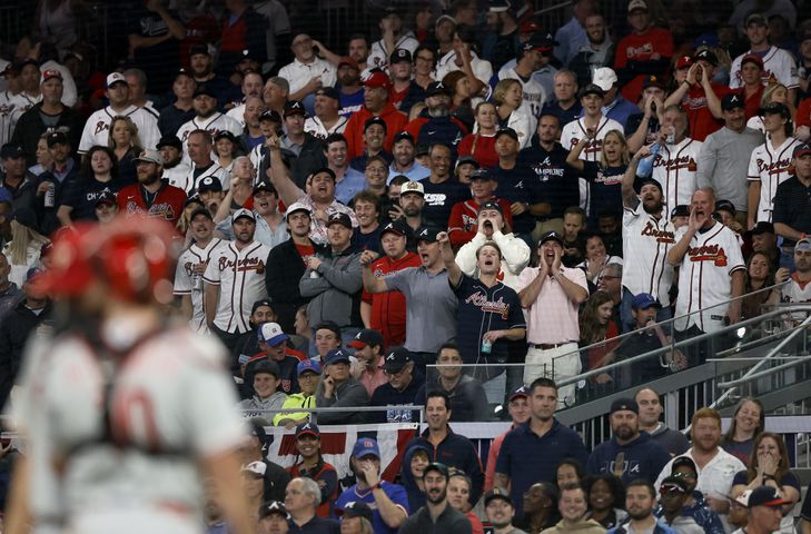 Fans react after Atlanta Braves right fielder Ronald Acuna was hit by a pitch from Philadelphia Phillies’ Zack Wheeler during the sixth inning of game two of the National League Division Series at Truist Park in Atlanta on Wednesday, October 12, 2022. (Jason Getz / Jason.Getz@ajc.com)