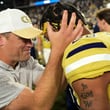 Georgia Tech interim head coach Brent Key celebrates with defensive back Clayton Powell-Lee (29) after defeating Duke 23-20 in overtime of an NCAA college football game, Saturday, Oct. 8, 2022, at Bobby Dodd Stadium, in Atlanta. (Daniel Varnado/Atlanta Journal-Constitution via AP)