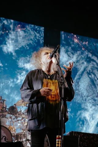 The Cure performs to an excited crowd at the State Farm Arena on June 27, 2023. (Sophie Harris for The Atlanta Journal-Constitution).