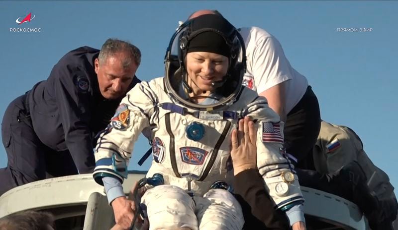 In this photo taken from video released by Roscosmos space corporation, rescue team members help NASA astronaut Tracy Dyson to leave the capsule shortly after the landing of the Russian Soyuz MS-25 space capsule carrying the NASA astronaut Tracy Dyson and the Roscosmos cosmonauts Oleg Kononenko and Nikolai Chub, south-east of the Kazakh town of Zhezkazgan, Kazakhstan, Monday, Sept. 23, 2024. (Roscosmos space corporation via AP)