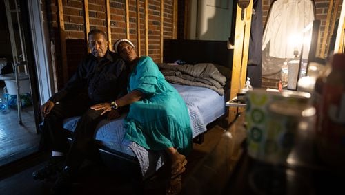 Dorothy and George Williams, who fell victim to a home repair scam, pose for a portrait in their home in Atlanta on Monday, May 13, 2024. (Arvin Temkar / AJC)