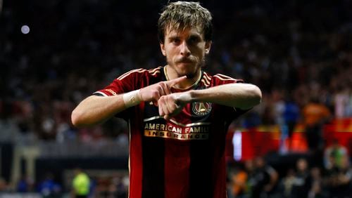 Atlanta United midfielder Saba Lobzhanidze (9) reacts after scoring during the second half of an MLS soccer match against Inter Miami, Wednesday, Sept. 18, 2024, in Atlanta. (Miguel Martinez/Atlanta Journal-Constitution via AP)