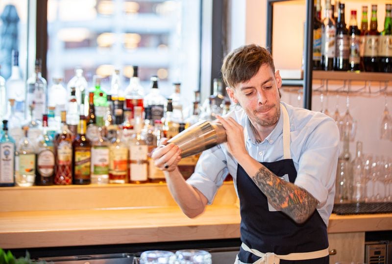 Tyler Reddick, bar manager at Indaco, creates the Ruby Slipper featuring Amaro Ciociaro, Sacred Bond brandy, house-made grenadine, lime juice and Burlesque Bitters. (Ryan Fleisher for The Atlanta Journal-Constitution) 