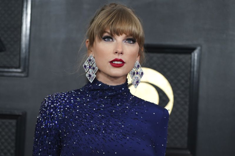 FILE - Taylor Swift arrives at the 65th annual Grammy Awards in Los Angeles on Feb. 5, 2023. (Photo by Jordan Strauss/Invision/AP, File)