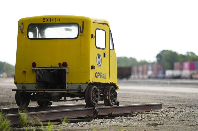 A old piece of rail equipment sits on display as trains sit idle at a Canadian Pacific Kansas City (CPKC) rail yard in Smiths Falls, Ont., on Thursday, Aug. 22, 2024. (Sean Kilpatrick /The Canadian Press via AP)