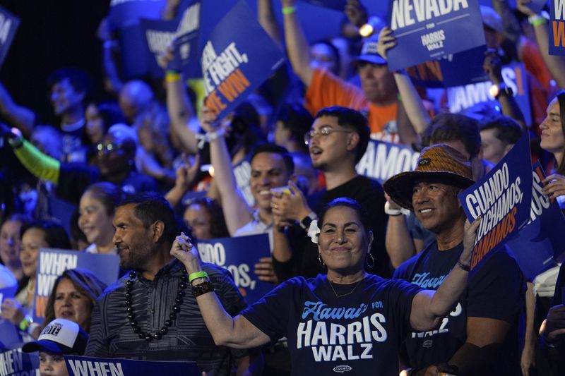 Attendees cheer during a rally for Democratic presidential nominee Vice President Kamala Harris on Sunday, Sept. 29, 2024, in Las Vegas. (AP Photo/Carolyn Kaster)