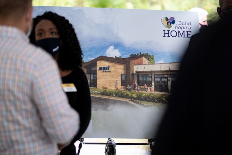 200923-Marietta-A drawing shows the front elevation of MUST Ministries’ new homeless shelter during a groundbreaking ceremony in Marietta on Wednesday, September 23, 2020. Ben Gray for the Atlanta Journal-Constitution