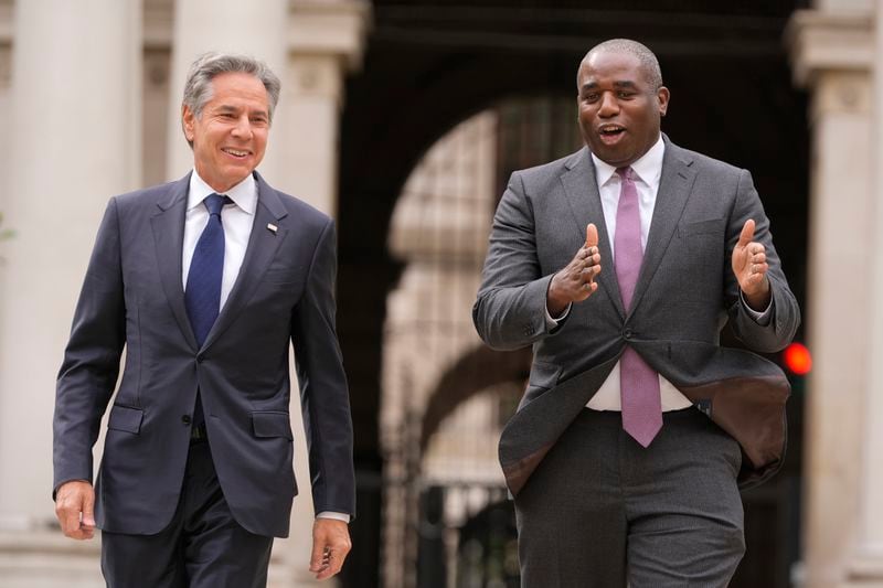 U.S. Secretary of State Antony Blinken, left, talks to Britain's Foreign Secretary David Lammy as he arrives for a meeting at the Foreign, Commonwealth and Development Office (FCDO) in London, Tuesday, Sept. 10, 2024. (AP Photo/Mark Schiefelbein, Pool)