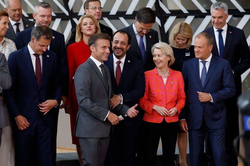Poland's Prime Minister Donald Tusk, front right, speaks with European Commission President Ursula von der Leyen, second right, Cypriot President Nikos Christodoulides, center, and French President Emmanuel Macron, second left, during a group photo at an EU summit in Brussels, Thursday, June 27, 2024. European Union leaders are expected on Thursday to discuss the next EU top jobs, as well as the situation in the Middle East and Ukraine, security and defence and EU competitiveness. (AP Photo/Geert Vanden Wijngaert)