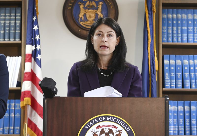 FILE - Attorney General Dana Nessel announces charges for several security guards from Northland Mall in the 2014 death of McKenzie Cochran during a news conference in Detroit, Oct. 14, 2021. (Max Ortiz/Detroit News via AP, File)