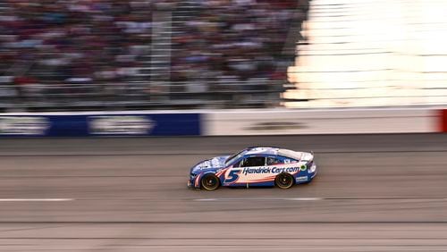 Kyle Larson steers through Turn 4 during a NASCAR Cup Series auto race at Darlington Raceway, Sunday, Sept. 1, 2024, in Darlington, S.C. (AP Photo/Matt Kelley)