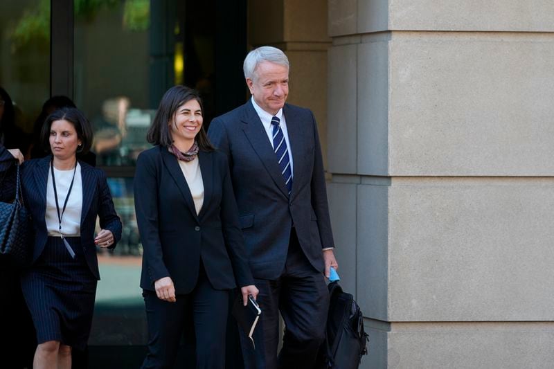 Eric Mahr, right, a lawyer representing Google in the Department of Justice's antitrust case against the tech giant, leaves the U.S. District Court for the Eastern District of Virginia for a lunch break in the trial, Monday, Sept. 9, 2024, in Alexandria, Va. (AP Photo/Stephanie Scarbrough)