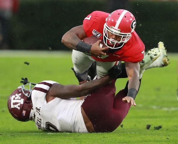 Photos: Bulldogs tested by Aggies in the rain in Athens