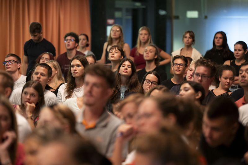 First-year students listen during an anatomy lecture using a live horse from Dr. Peter Sotonyi, rector of the University of Veterinary Medicine in Budapest, Hungary, using a live horse, Monday, Sept 9. 2024. (AP Photo/Denes Erdos)