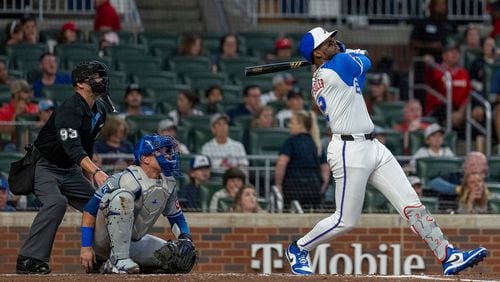 Atlanta Braves' Jorge Soler hits a double to center field in the fourth inning of a baseball game against the Kansas City Royals, Saturday, Sept. 28, 2024, in Atlanta. (AP Photo/Jason Allen)