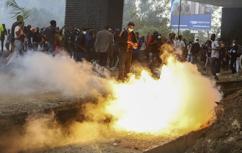 A teargas canister explodes during a protest over proposed tax hikes in a finance bill that is due to be tabled in parliament in Nairobi, Kenya, Thursday, June 20, 2024. Civil society groups say that despite the dozens of arrests, demonstrations and a planned sit-down outside the parliament buildings will continue. (AP Photo/ Andrew Kasuku)