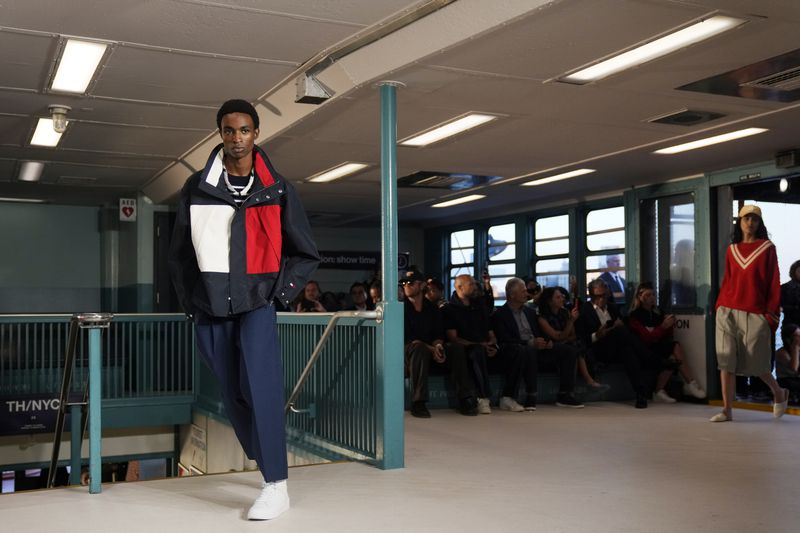 Models walk the runway during the Tommy Hilfiger Spring/Summer 2025 fashion show onboard a Staten Island Ferry as part of New York Fashion Week on Sunday, Sept. 8, 2024, in New York. (Photo by Charles Sykes/Invision/AP)