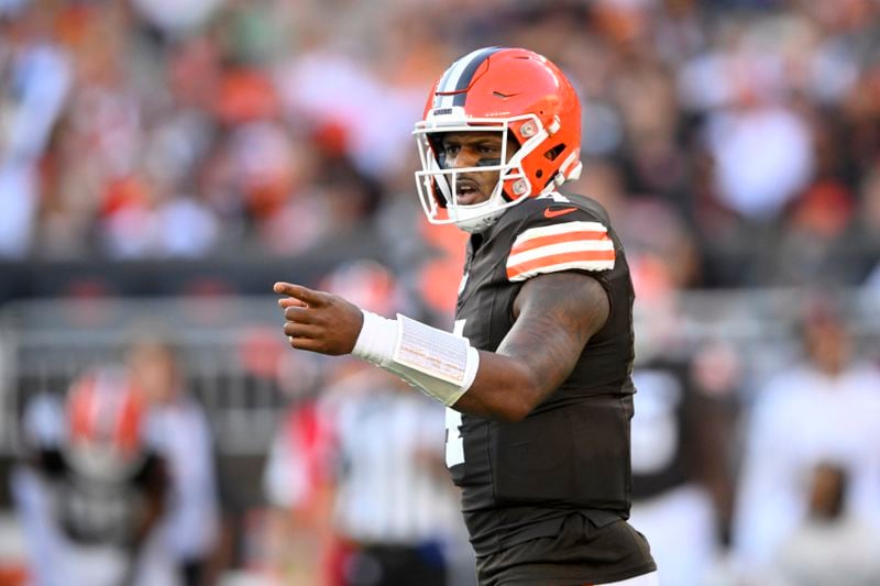 Dallas Cowboys' Dak Prescott (4) gestures at the line of scrimmage in the second half of an NFL football game against the Dallas Cowboys in Cleveland, Sunday, Sept. 8, 2024. (AP Photo/David Richard)