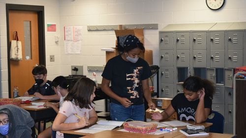 Amira Jackson (center) recruited fellow Brookwood High students to tutor in Gwinnett's Summer Enrichment and Acceleration program.