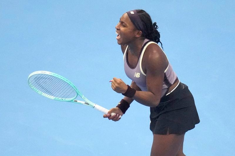 Coco Gauff of the United States celebrates after defeating Paula Badosa of Spain in a women's singles semi-final match for the China Open tennis tournament at the National Tennis Center in Beijing, Saturday, Oct. 5, 2024. (AP Photo/Achmad Ibrahim)