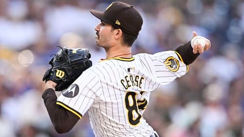 San Diego Padres starting pitcher Dylan Cease (84) delivers during the first inning of a baseball game against the Los Angeles Dodgers, Wednesday, July 31, 2024, in San Diego. (AP Photo/Denis Poroy)