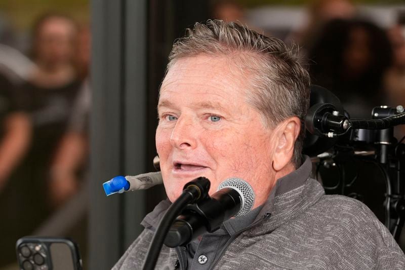 Sam Schmidt speaks during a ribbon-cutting ceremony for the not-for-profit Conquer Paralysis Now center in partnership with NeuroHope, Tuesday, Oct. 1, 2024, in Indianapolis. (AP Photo/Darron Cummings)