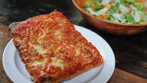 Brooklyn Sicilian slice and caesar salad from O4W Pizza.