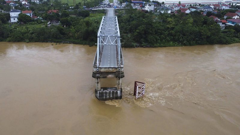 A bridge collapse due to floods triggered by typhoon Yagi in Phu Tho province, Vietnam on Monday, Sept. 9, 2024 (Bui Van Lanh/ VNA via AP)