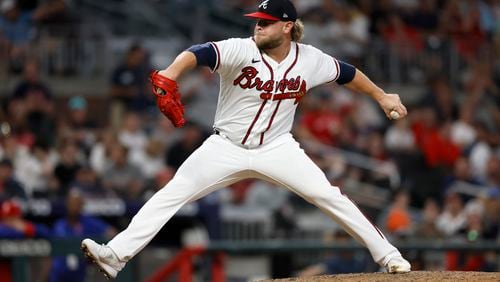 Atlanta Braves relief pitcher A.J. Minter delivers to a Philadelphia Phillies batter during the seventh inning at Truist Park, Saturday, September 17, 2022, in Atlanta. (Jason Getz / Jason.Getz@ajc.com)