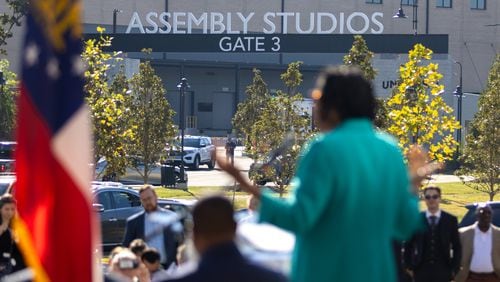 A grand opening ceremony for Veranda at Assembly, a new apartment building, takes place in Doraville on Thursday, September 19, 2024, with a view of Assembly Studios across the street. The Assembly redevelopment site was formerly a GM plant. (Arvin Temkar / AJC)