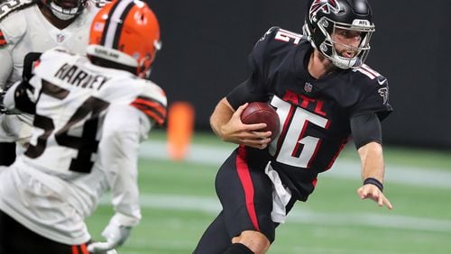 082921 Atlanta: Atlanta Falcons backup quarterback Josh Rosen avoids the pressure from Cleveland Browns defenders breaking loose for yardage during the second half in a NFL preseason football game on Sunday, August 29, 2021, in Atlanta.   “Curtis Compton / Curtis.Compton@ajc.com”