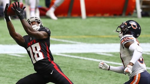 092720 Atlanta: Atlanta Falcons wide receiver Calvin Ridley catches a long pass from quarterback Matt Ryan to setup a touchdown on the Falcons' first drive and first offensive play of the game against the Chicago Bears Sunday, Sept. 27, 2020, at Mercedes-Benz Stadium in Atlanta. (Curtis Compton / Curtis.Compton@ajc.com)