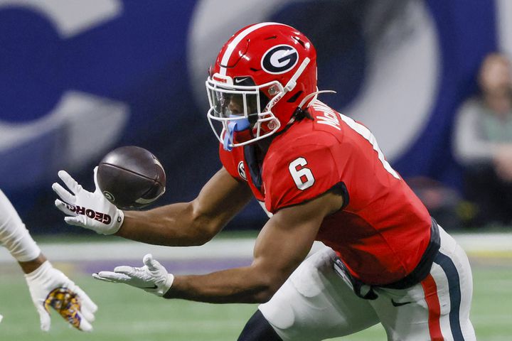 Georgia Bulldogs running back Kenny McIntosh (6) bobbles the football against the LSU Tigers during the second half of the SEC Championship Game at Mercedes-Benz Stadium in Atlanta on Saturday, Dec. 3, 2022. (Bob Andres / Bob Andres for the Atlanta Constitution)
