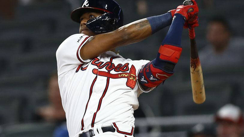 Ronald Acuna Jr. #13 of the Atlanta Braves is congratulated by