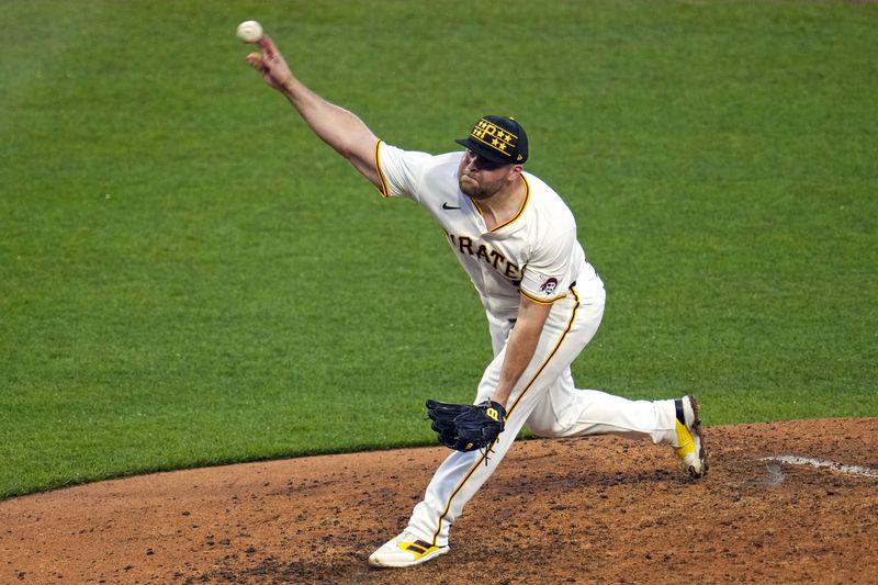 Pittsburgh Pirates relief pitcher David Bednar delivers during the ninth inning of a baseball game against the Atlanta Braves in Pittsburgh, Saturday, May 25, 2024. (AP Photo/Gene J. Puskar)