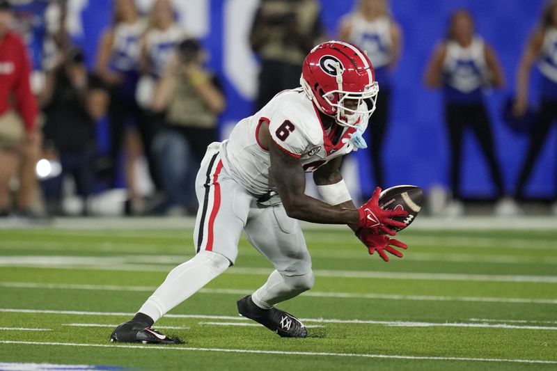 Georgia wide receiver Dominic Lovett makes a catch during the first half of an NCAA college football game against Kentucky, Saturday, Sept. 14, 2024, in Lexington, Ky. (AP Photo/Darron Cummings)