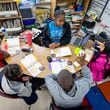 Shamaudie McClendon works with her third grade students on their reading skills at Kimberly Elementary School in Atlanta on Tuesday, Dec. 5, 2023. In the new state budget, Georgia lawmakers inserted nearly $8 million toward literacy mandates they adopted last year. (Steve Schaefer/steve.schaefer@ajc.com)