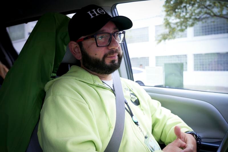 Jose Torres, manager of the San Francisco Homeless Outreach Team, sits in his van Tuesday, Sept. 10, 2024, in San Francisco. (AP Photo/Terry Chea)