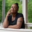 LaShonda Harrell, 43, of Austell was diagnosed two years ago with Stage 4 metastasized breast cancer. Because of her pain level, she’s only able to work a few hours per week as a Publix grocery clerk — not enough to qualify for the Georgia Pathways to Coverage plan. (Elijah Nouvelage for The Atlanta Journal-Constitution)