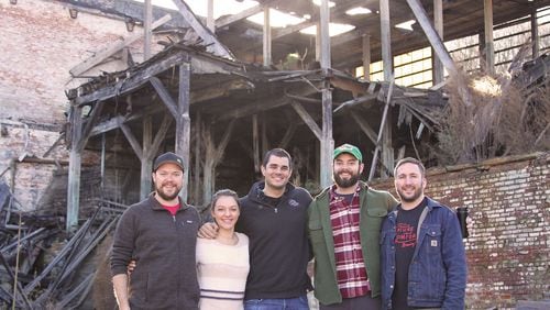 Creature Comforts' five original employees. From left to right: Adam Beauchamp (Co-founder & Brewmaster), Katie Beauchamp (Tasting Room General Manager & Community Outreach), Chris Herron (Co-founder & CEO), Blake Tyers (Wood Cellar & Specialty Brand Manager), and David Stein (Co-founder & Head Brewer). Credit: Creature Comforts.