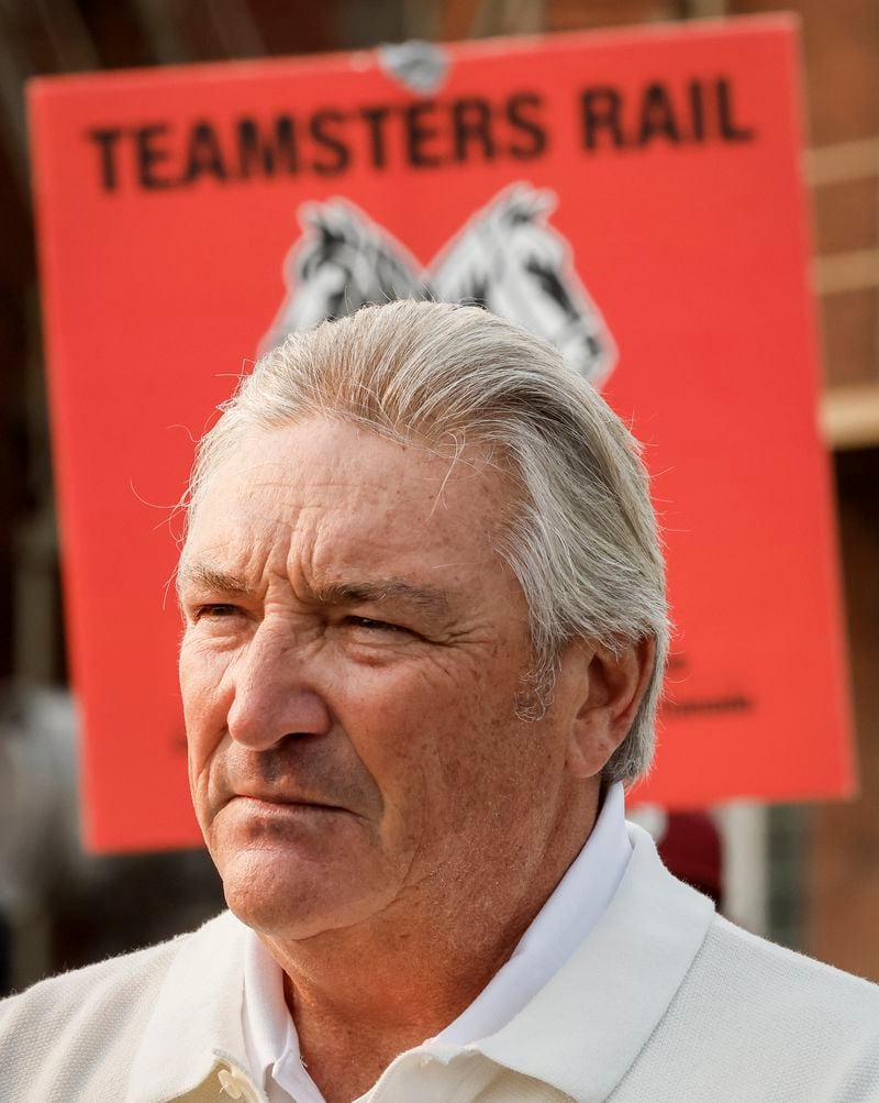 Francois Laporte, National President, Teamsters Canada, speaks to media as picketing rail workers gather at the CPKC headquarters in Calgary, Alta., Friday, Aug. 23, 2024.(Jeff McIntosh /The Canadian Press via AP)