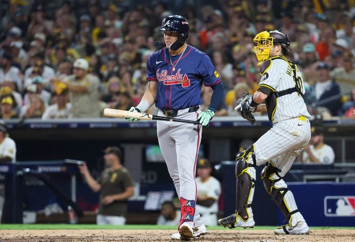 Atlanta Braves’ Gio Urshela strikes out in front of San Diego Padres catcher Kyle Higashioka during the fifth inning of National League Division Series Wild Card Game Two at Petco Park in San Diego on Wednesday, Oct. 2, 2024.   (Jason Getz / Jason.Getz@ajc.com)