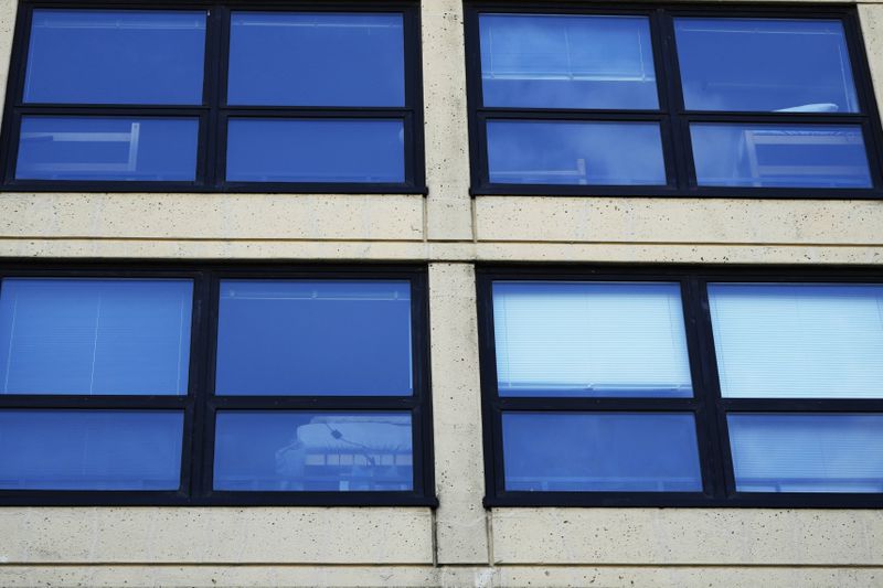 School dormitory windows are seen at the DePaul University in Chicago, Wednesday, Aug. 28, 2024. (AP Photo/Nam Y. Huh)