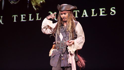 ANAHEIM, CA - AUGUST 15:  Actor Johnny Depp,  dressed as Captain Jack Sparrow, of PIRATES OF THE CARIBBEAN: DEAD MEN TELL NO TALES took part today in "Worlds, Galaxies, and Universes: Live Action at The Walt Disney Studios" presentation at Disney's D23 EXPO 2015 in Anaheim, Calif.  (Photo by Jesse Grant/Getty Images for Disney)